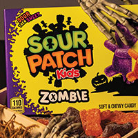 Skeleton hands grabbing at Zombie Sour Patch Kids